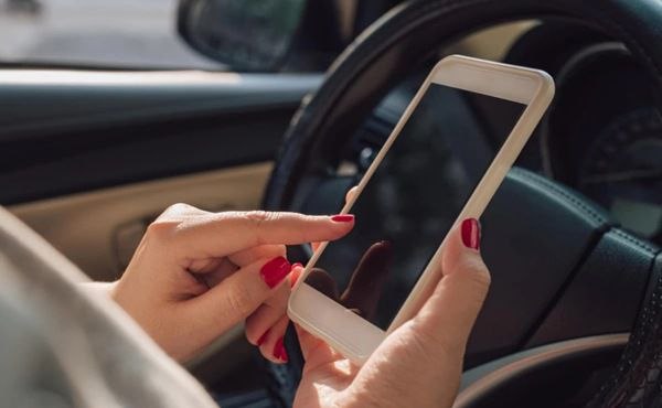 One Phone Call While Driving Could Cost You KD 300 — or Your Freedom
